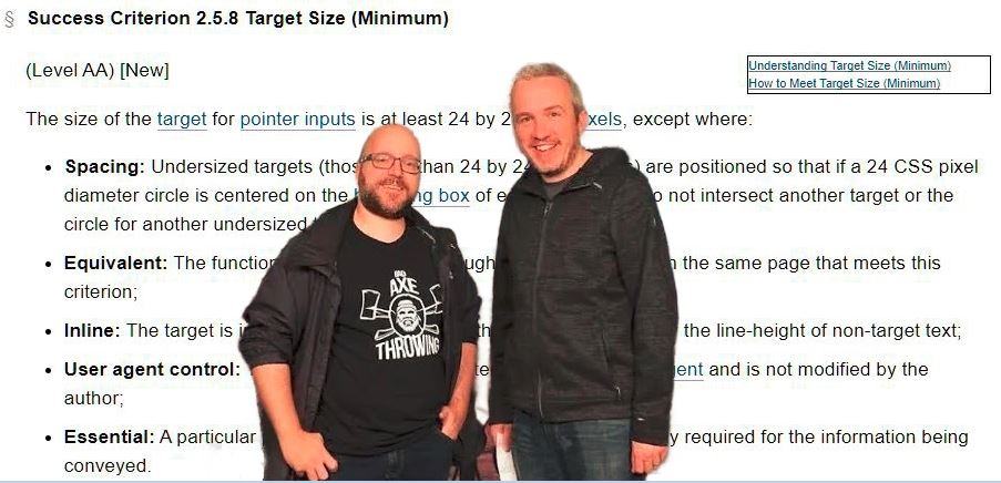 Patrick and David pose in front of a billboard outside of Accessibility World Headquarters, which is displaying the full text of 2.5.8 target size 