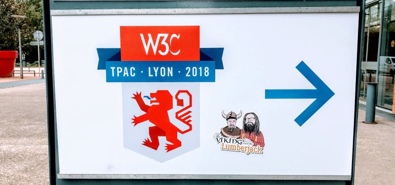 TPAC 2018 Lyon banner outside of the venue, to which I stuck a Viking & Lumberjack sticker