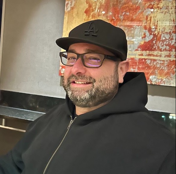 Gerard at the bar, looking relaxed in all black at CSUN 2025