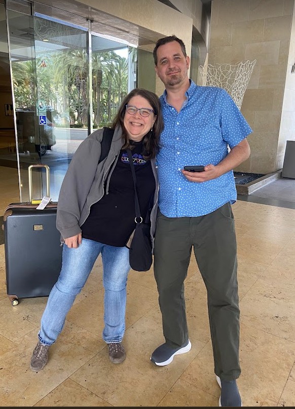 Glenda posing with John Metz outside of the CSUN hotel.